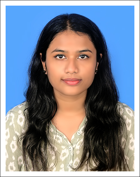Professional headshot of a developer smiling with modern office background